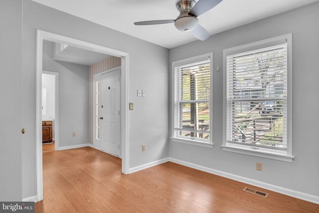 451 Lovell Ct, Hummelstown, PA 17036 - unfurnished room featuring baseboards, visible vents, a ceiling fan, and light wood-type flooring