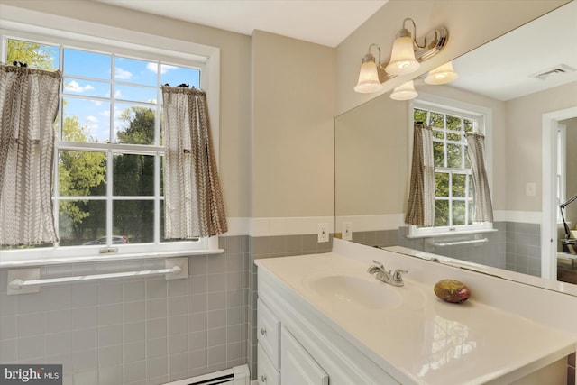 83 Winding Ln, Newtown, PA 18940 - bathroom featuring vanity, wainscoting, tile walls, and visible vents