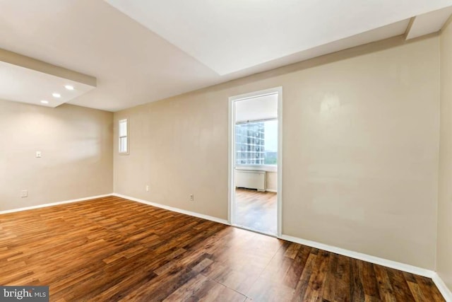 4600 Duke St Unit 1118, Alexandria, VA 22304 - unfurnished room with wood finished floors, baseboards, and recessed lighting