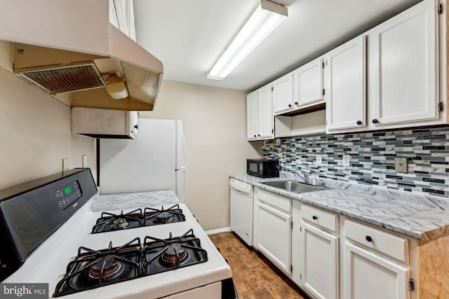 4600 Duke St Unit 1118, Alexandria, VA 22304 - kitchen featuring white appliances, a sink, under cabinet range hood, decorative backsplash, and light countertops