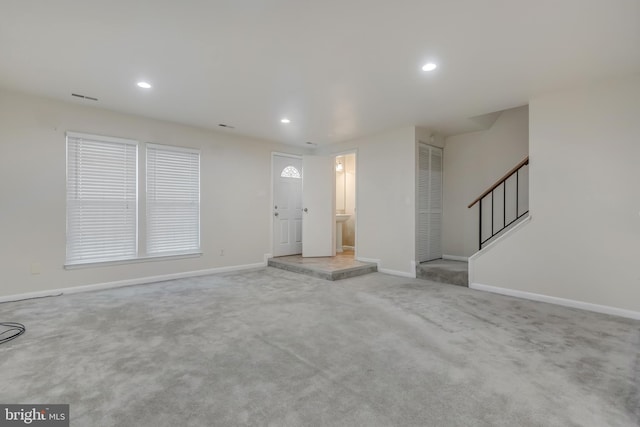 11409 Fruitwood Way Unit 163, Germantown, MD 20876 - unfurnished living room featuring carpet floors, baseboards, recessed lighting, stairway, and a sink