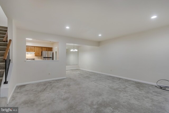 11409 Fruitwood Way Unit 163, Germantown, MD 20876 - unfurnished living room featuring stairs, recessed lighting, light carpet, and baseboards