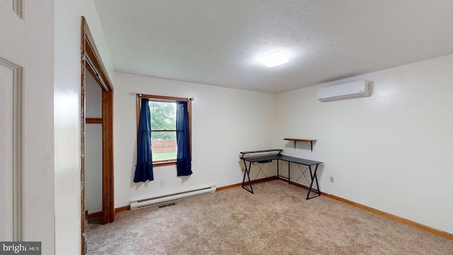 521 E Rdg Loop Rd, Romney, WV 26757 - interior space featuring a textured ceiling, a wall unit AC, baseboards, and a baseboard heating unit
