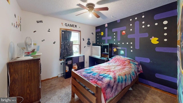 521 E Rdg Loop Rd, Romney, WV 26757 - bedroom with carpet flooring, a ceiling fan, a textured ceiling, baseboards, and a baseboard heating unit