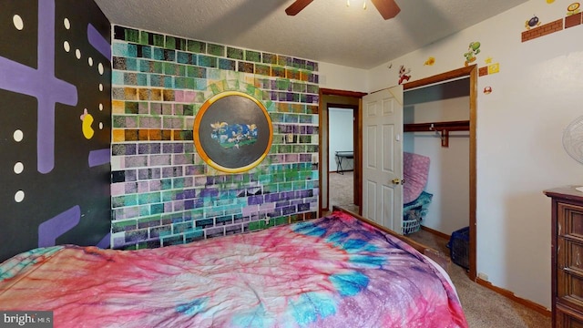 521 E Rdg Loop Rd, Romney, WV 26757 - bedroom featuring baseboards, a closet, a ceiling fan, and carpet floors