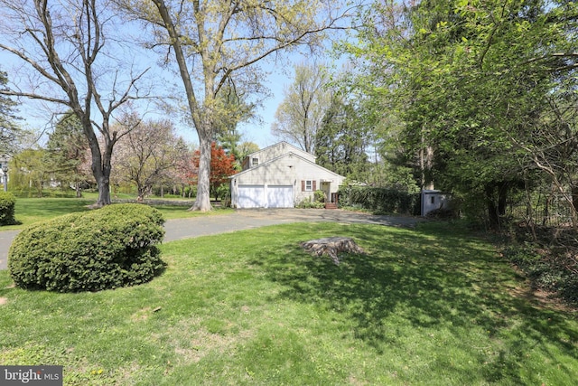 72 Bennett Dr, Doylestown, PA 18901 - view of yard featuring driveway and a garage