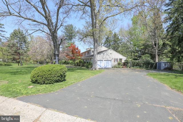72 Bennett Dr, Doylestown, PA 18901 - exterior space with driveway, a lawn, and a garage