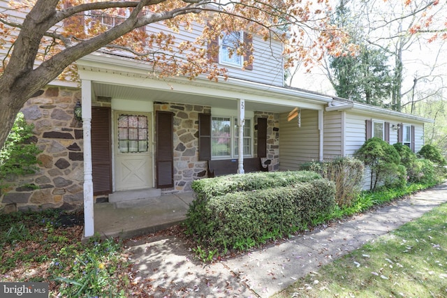 72 Bennett Dr, Doylestown, PA 18901 - property entrance featuring stone siding and covered porch