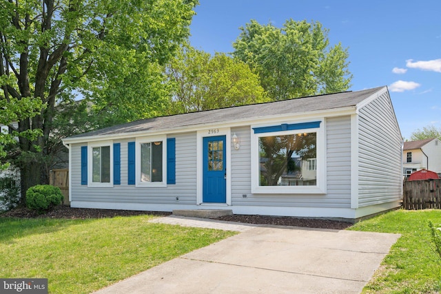 2963 Crystal Palace Ln, Pasadena, MD 21122 - view of front of property with fence and a front yard