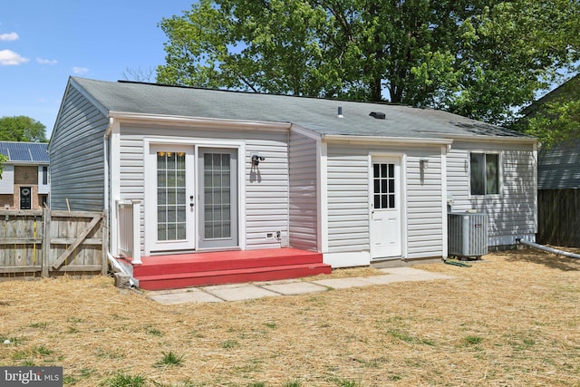 2963 Crystal Palace Ln, Pasadena, MD 21122 - rear view of house with fence, roof with shingles, cooling unit, and french doors