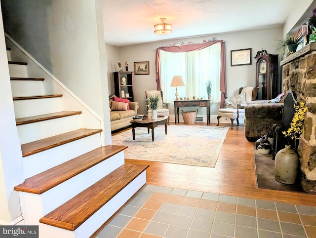 tiled living room with stairs