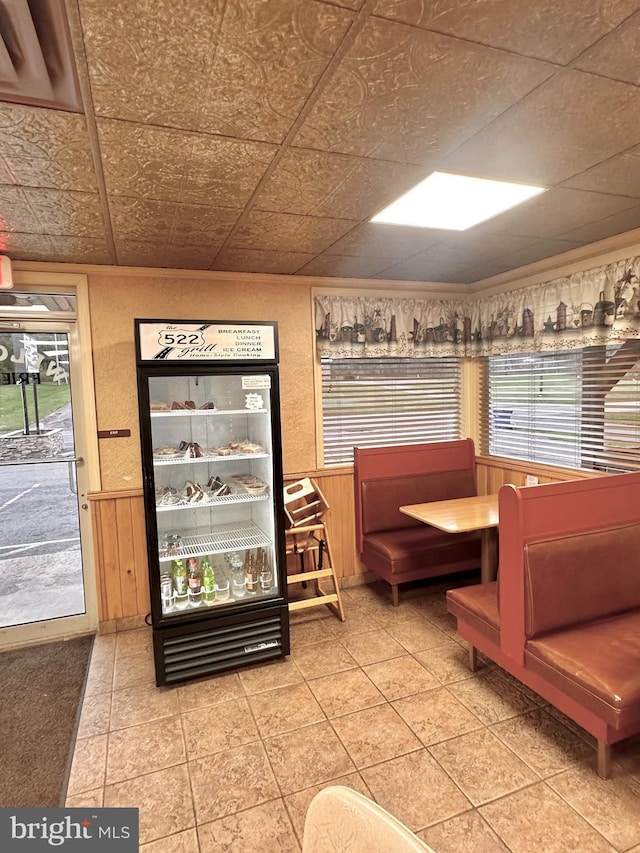 interior space with tile patterned floors and plenty of natural light
