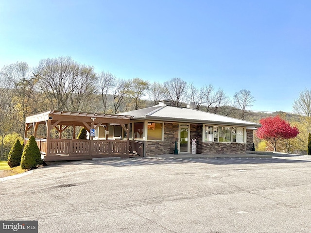 view of front of property featuring stone siding
