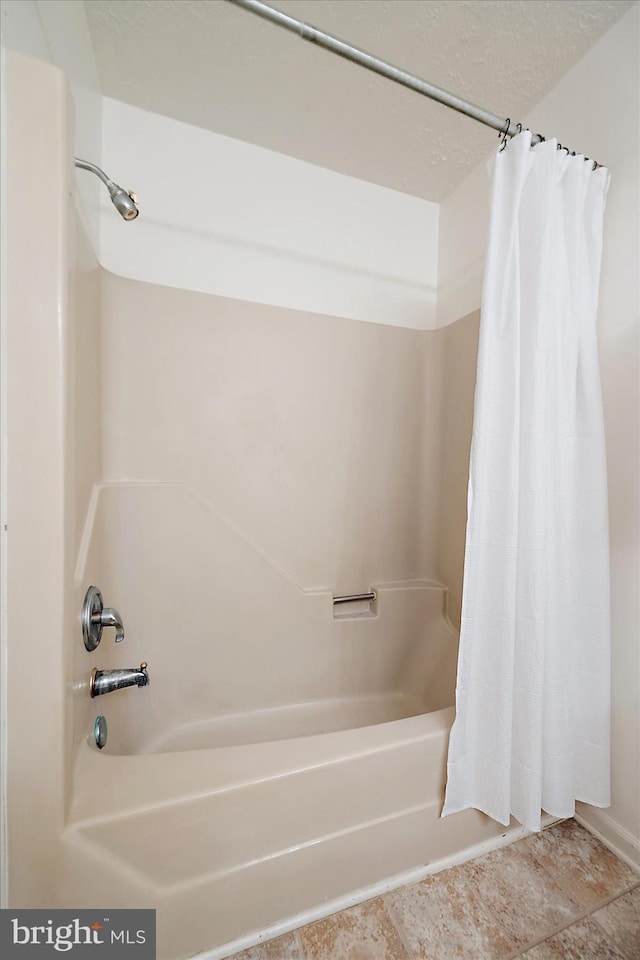 full bath featuring shower / bathtub combination with curtain