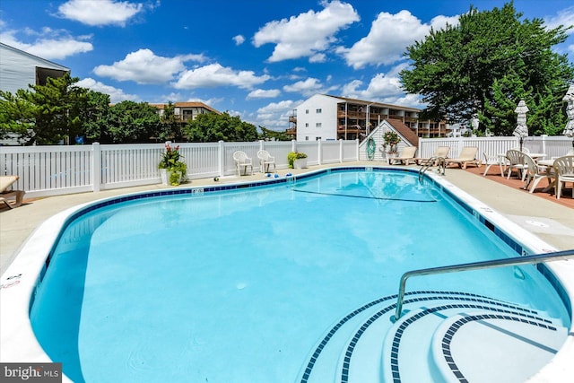community pool with fence