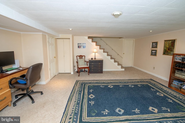 carpeted office featuring baseboards