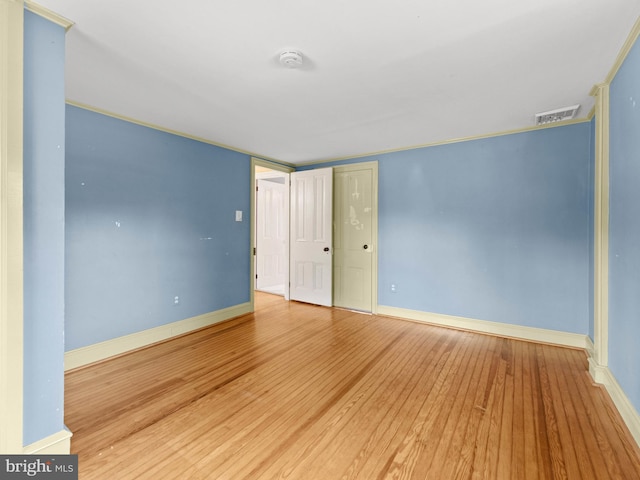 108 Delaware St, Woodbury, NJ 08096 - empty room featuring wood finished floors, baseboards, and a smoke detector