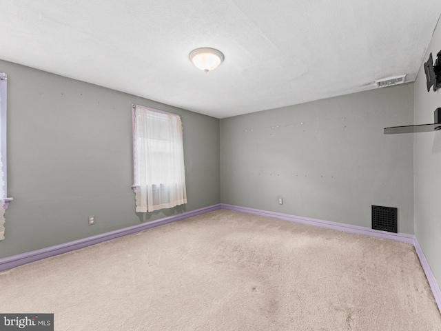 108 Delaware St, Woodbury, NJ 08096 - empty room with carpet floors and baseboards