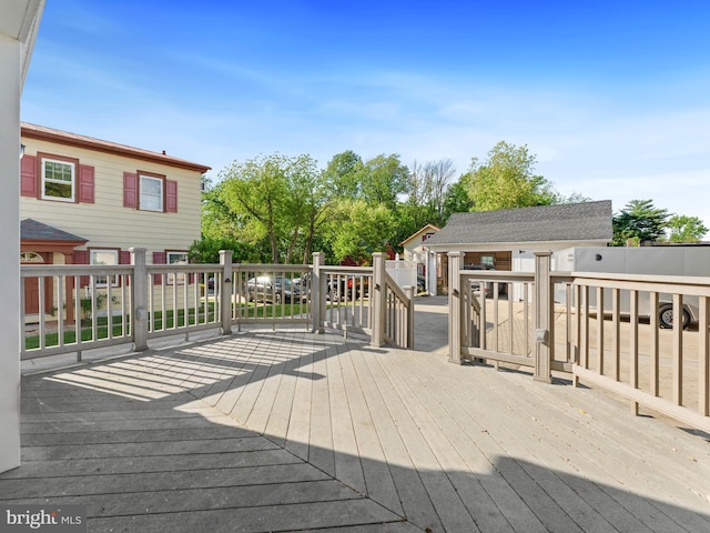 108 Delaware St, Woodbury, NJ 08096 - wooden deck featuring an outdoor structure