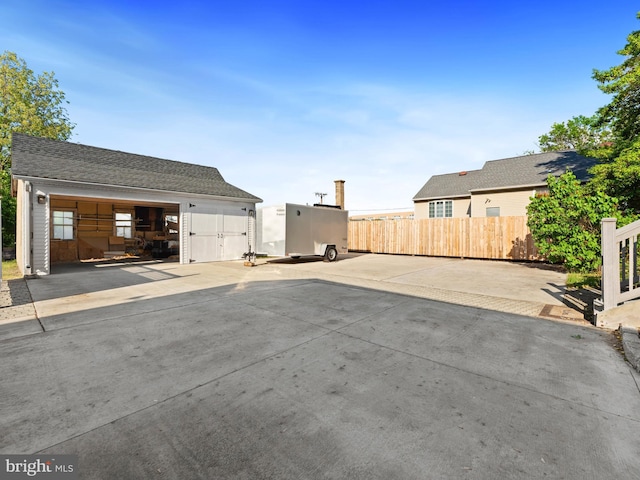 108 Delaware St, Woodbury, NJ 08096 - view of patio / terrace with fence, an outdoor structure, and a detached garage