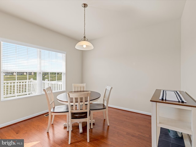 20822 Brunswick Ln, Millsboro, DE 19966 - dining space featuring baseboards and wood finished floors