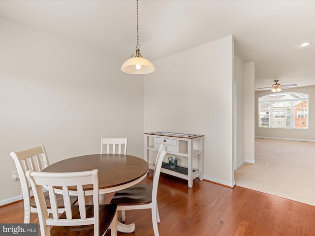 20822 Brunswick Ln, Millsboro, DE 19966 - dining room featuring baseboards, wood finished floors, and ceiling fan