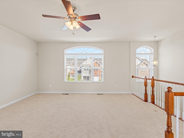 20822 Brunswick Ln, Millsboro, DE 19966 - carpeted empty room featuring ceiling fan and baseboards