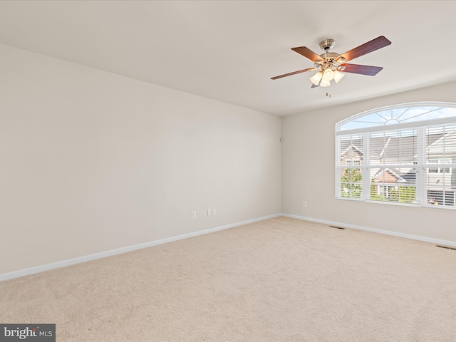 20822 Brunswick Ln, Millsboro, DE 19966 - empty room with carpet flooring, baseboards, and a ceiling fan