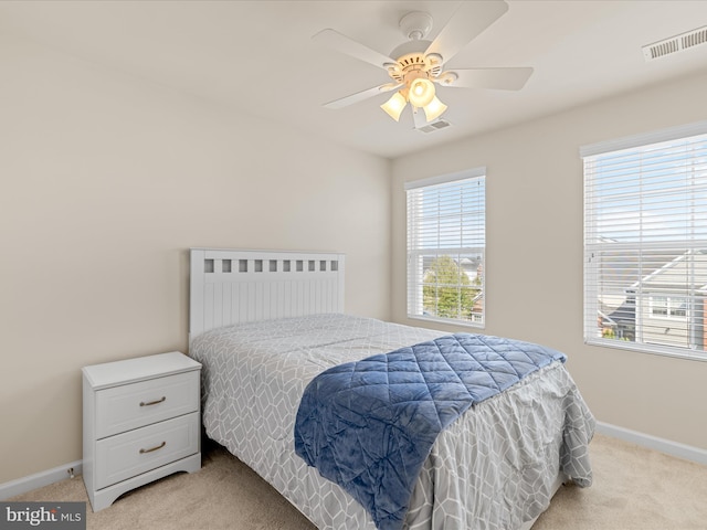 20822 Brunswick Ln, Millsboro, DE 19966 - bedroom featuring light carpet, baseboards, and a ceiling fan