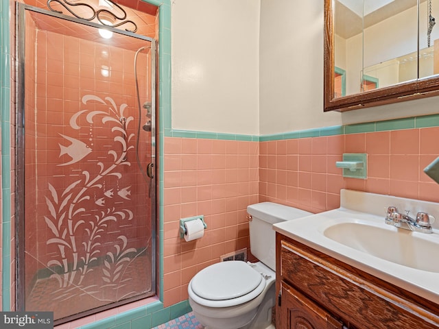 6833 E Roosevelt Blvd, Philadelphia, PA 19149 - full bath with tile walls, a shower stall, vanity, toilet, and wainscoting