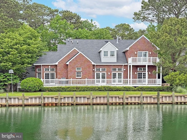 536 Yacht Club Dr, Ocean Pines, MD 21811 - back of house with brick siding, a water view, and a balcony