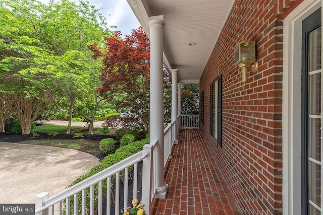 536 Yacht Club Dr, Ocean Pines, MD 21811 - view of side of property with covered porch and brick siding