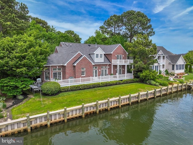 536 Yacht Club Dr, Ocean Pines, MD 21811 - rear view of house with a water view and a balcony