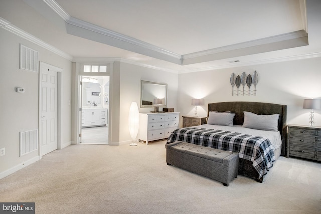 18565 Kerill Rd, Triangle, VA 22172 - carpeted bedroom with a tray ceiling, ornamental molding, baseboards, and ensuite bath