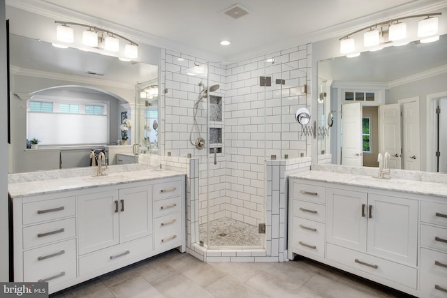 18565 Kerill Rd, Triangle, VA 22172 - full bathroom featuring crown molding, a shower stall, two vanities, tile patterned flooring, and recessed lighting