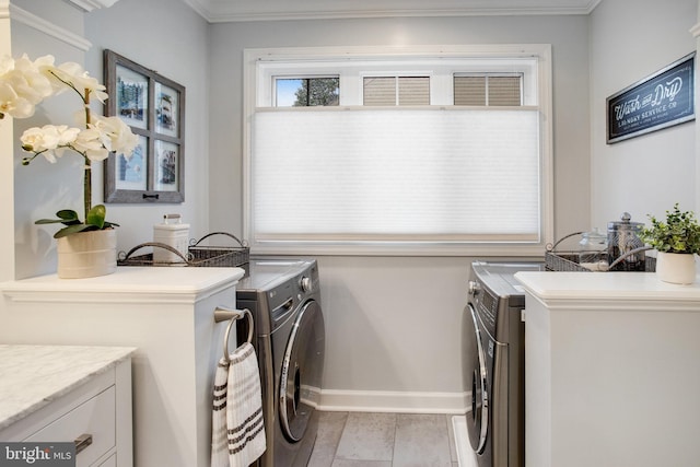 18565 Kerill Rd, Triangle, VA 22172 - laundry room featuring washing machine and dryer, baseboards, and crown molding