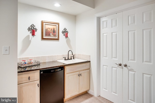 18565 Kerill Rd, Triangle, VA 22172 - kitchen with dishwasher, a sink, light brown cabinets, dark stone counters, and light carpet