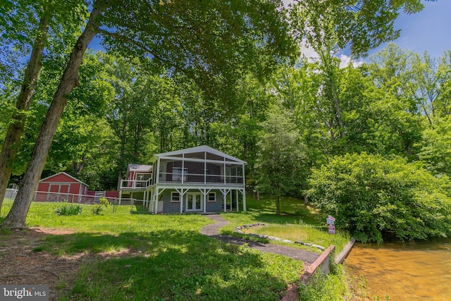 10 Mahon Cir, Ruther Glen, VA 22546 - rear view of property featuring a sunroom, french doors, and a deck