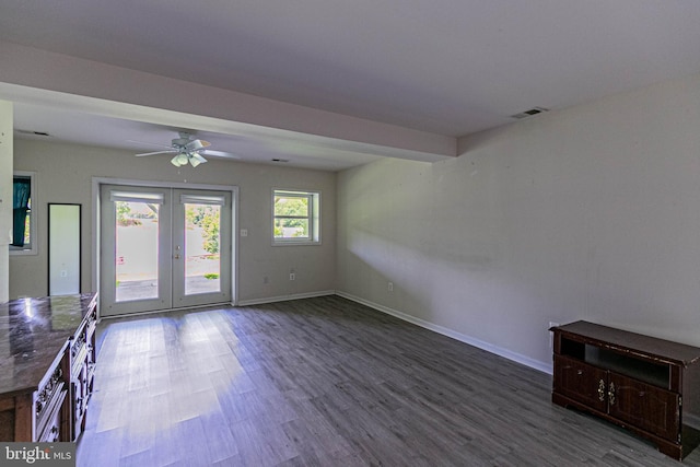 10 Mahon Cir, Ruther Glen, VA 22546 - unfurnished living room with french doors, a ceiling fan, wood finished floors, and baseboards