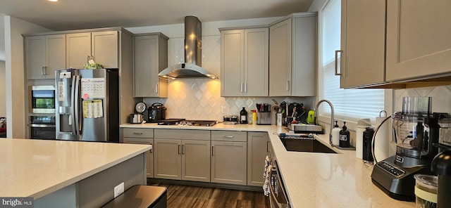 21340 Rainier Ln, Broadlands, VA 20148 - kitchen featuring gray cabinets, wall chimney exhaust hood, stainless steel appliances, and a sink