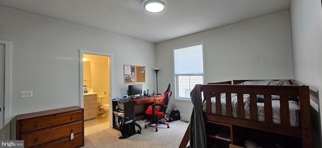 21340 Rainier Ln, Broadlands, VA 20148 - bedroom featuring an office area, light carpet, and ensuite bath