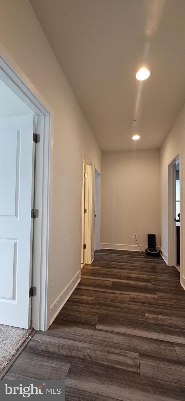 21340 Rainier Ln, Broadlands, VA 20148 - corridor featuring dark wood-style flooring, recessed lighting, and baseboards