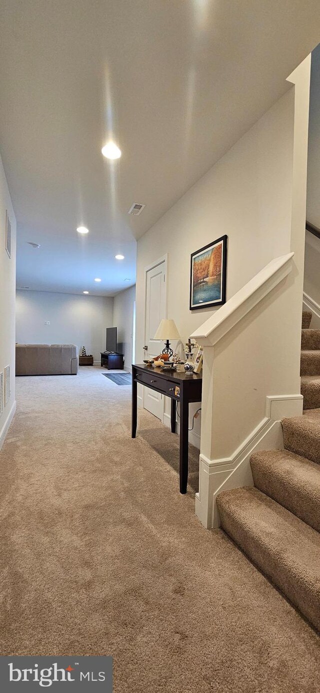 21340 Rainier Ln, Broadlands, VA 20148 - hallway featuring carpet flooring, stairs, and recessed lighting