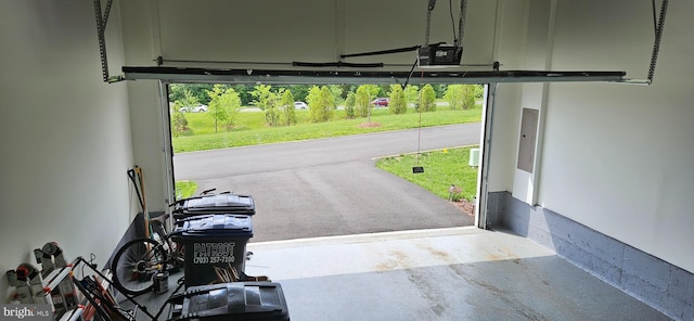 21340 Rainier Ln, Broadlands, VA 20148 - garage featuring a garage door opener