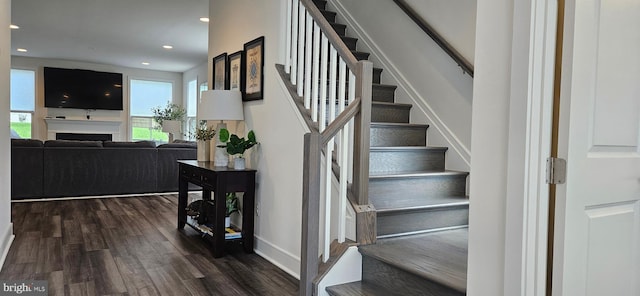 21340 Rainier Ln, Broadlands, VA 20148 - staircase with wood finished floors, recessed lighting, baseboards, and a fireplace