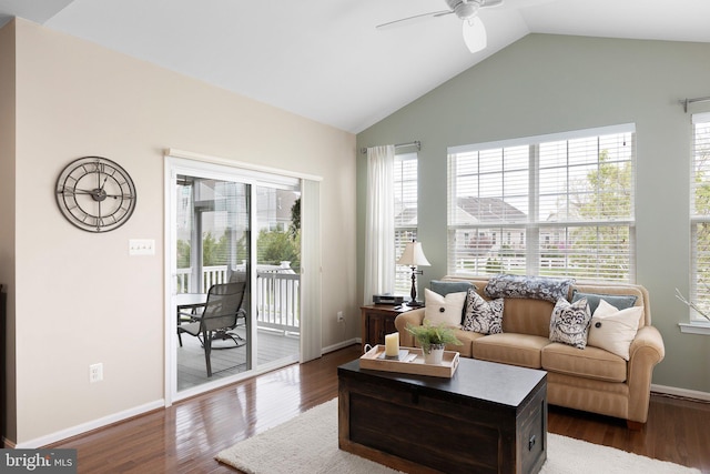living area featuring lofted ceiling, a wealth of natural light, ceiling fan, and dark wood-style floors