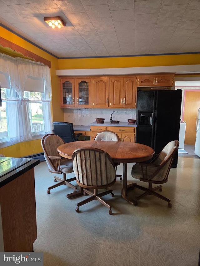 dining area featuring a baseboard radiator
