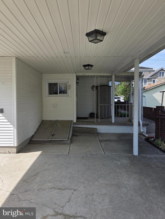 view of patio / terrace featuring an attached carport