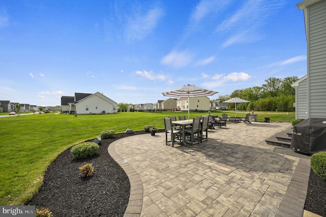 40 Mannings Ct, Smyrna, DE 19977 - view of patio featuring a residential view, outdoor dining area, and a grill