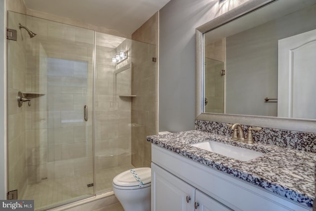 30780 Lindell Ln, Frankford, DE 19945 - bathroom featuring vanity, a shower stall, and toilet